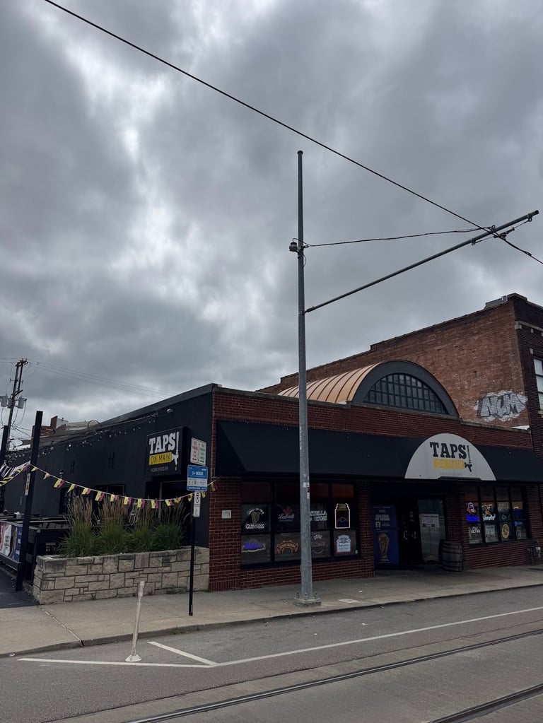 Taps On Main Kansas City bar storefront before commercial permanent LED lighting installation